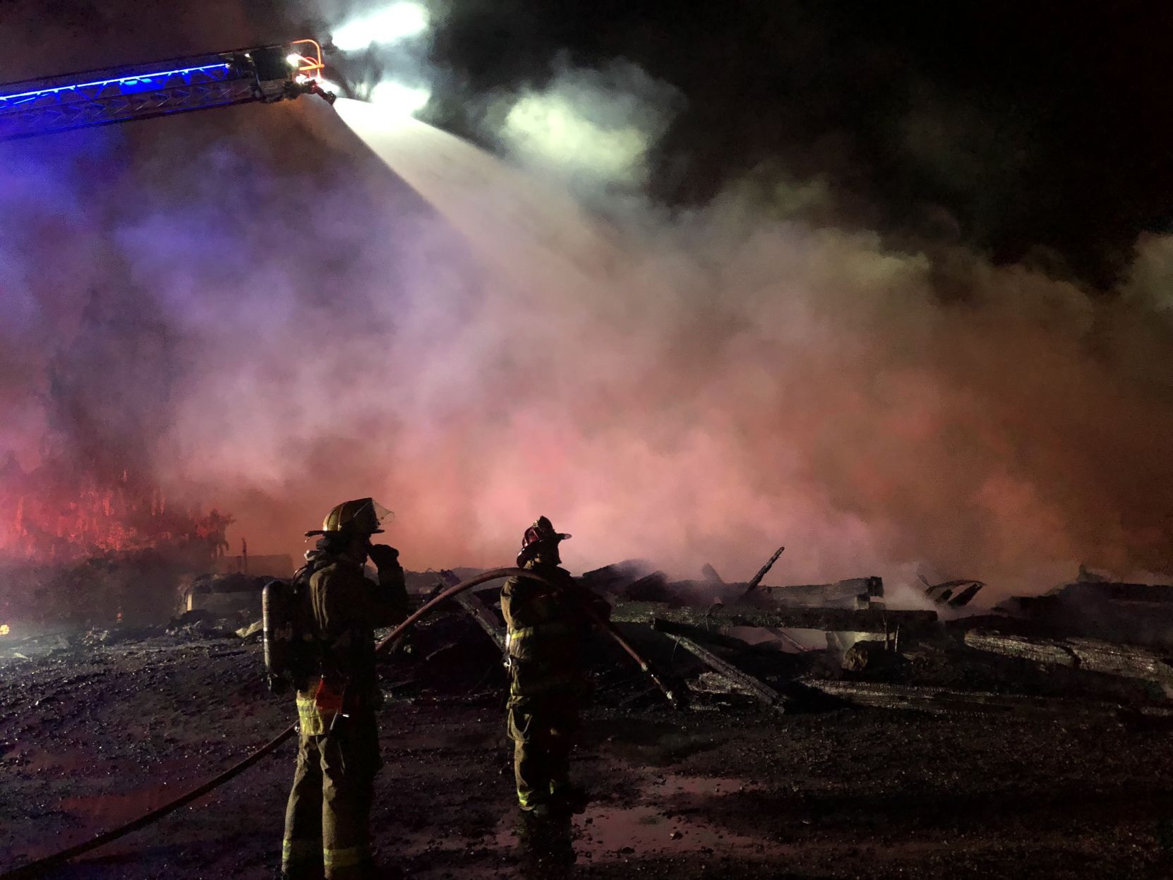 Firefighters work to control Stratham fire
